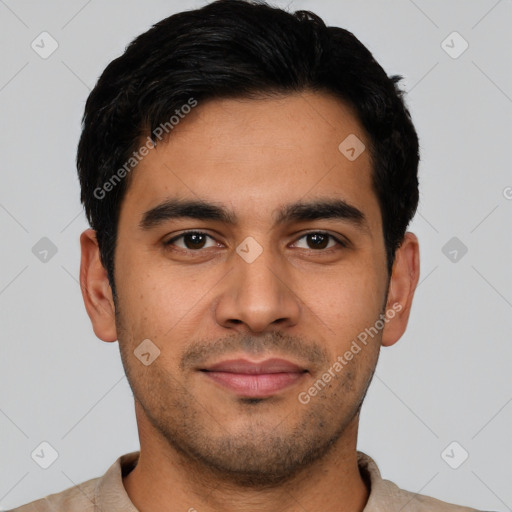 Joyful latino young-adult male with short  black hair and brown eyes