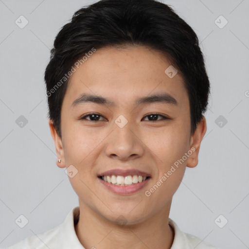 Joyful asian young-adult male with short  black hair and brown eyes