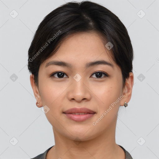 Joyful asian young-adult female with short  brown hair and brown eyes