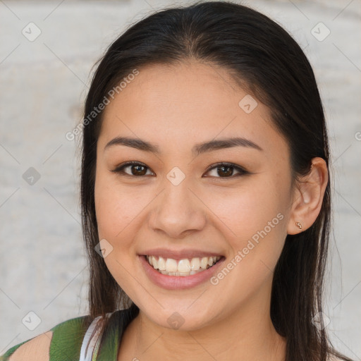 Joyful white young-adult female with long  brown hair and brown eyes