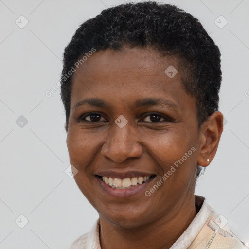 Joyful latino adult female with short  brown hair and brown eyes