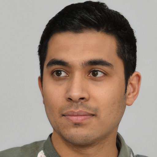 Neutral latino young-adult male with short  black hair and brown eyes