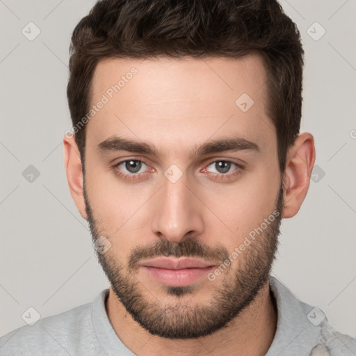 Neutral white young-adult male with short  brown hair and brown eyes