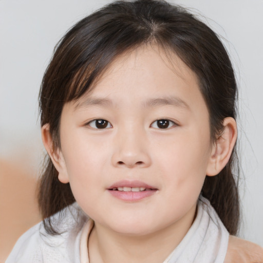 Joyful asian child female with medium  brown hair and brown eyes