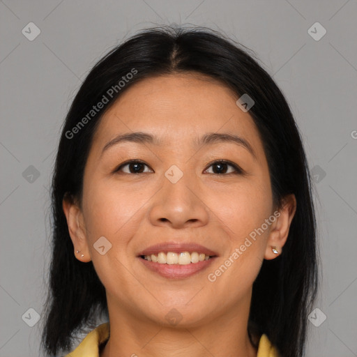 Joyful asian young-adult female with medium  brown hair and brown eyes