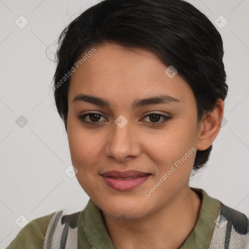 Joyful latino young-adult female with medium  brown hair and brown eyes