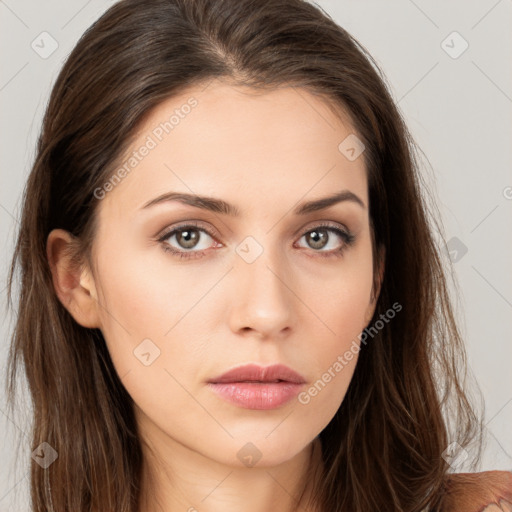 Neutral white young-adult female with long  brown hair and brown eyes