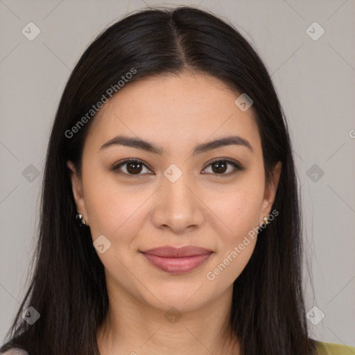 Joyful latino young-adult female with long  brown hair and brown eyes