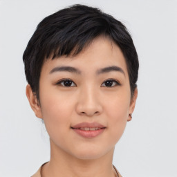 Joyful asian young-adult female with short  black hair and brown eyes