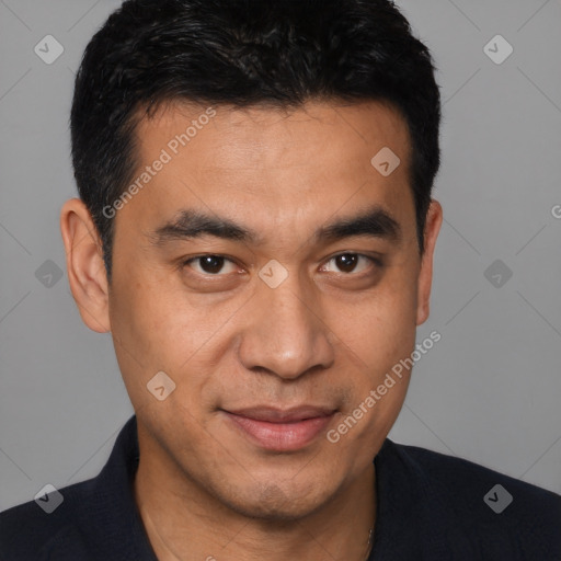 Joyful white young-adult male with short  black hair and brown eyes