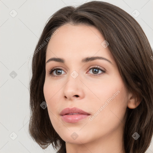 Neutral white young-adult female with medium  brown hair and brown eyes