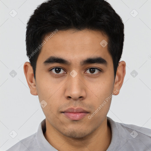 Neutral latino young-adult male with short  black hair and brown eyes