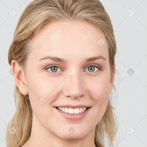 Joyful white young-adult female with long  brown hair and blue eyes