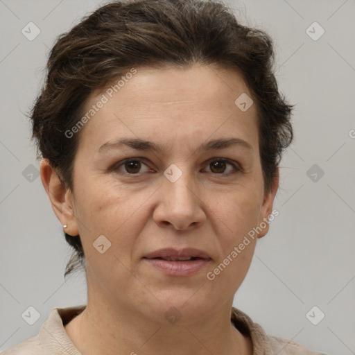 Joyful white adult female with short  brown hair and brown eyes