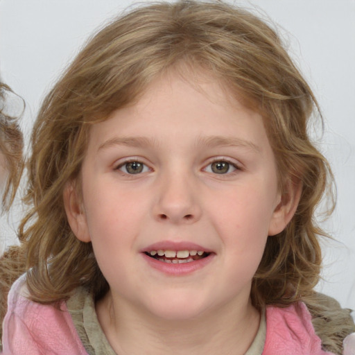 Joyful white child female with medium  brown hair and grey eyes