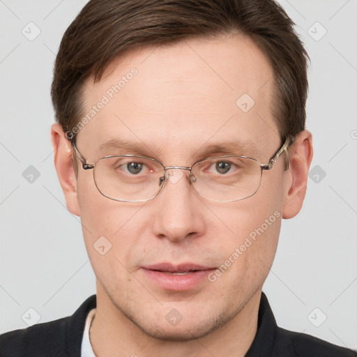 Joyful white adult male with short  brown hair and grey eyes