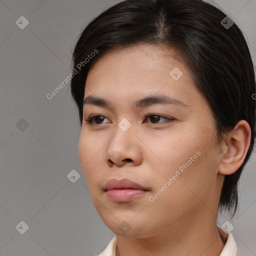 Neutral asian young-adult female with medium  brown hair and brown eyes