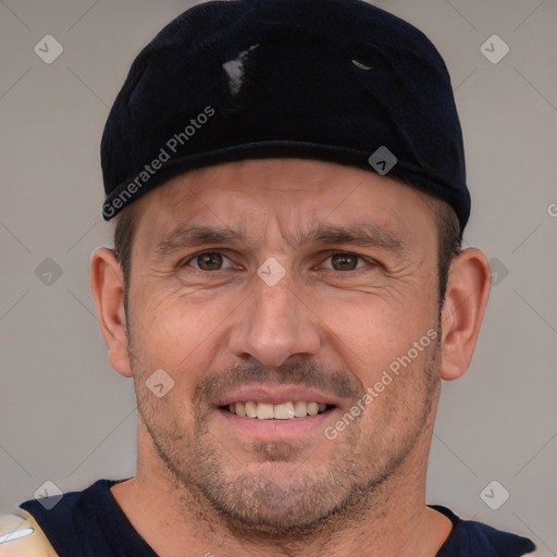 Joyful white adult male with short  brown hair and brown eyes