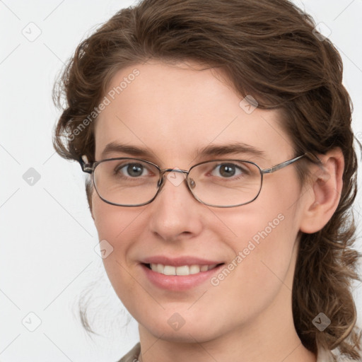 Joyful white young-adult female with medium  brown hair and blue eyes