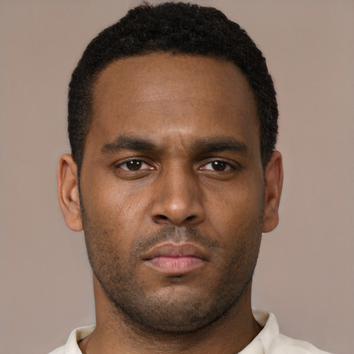 Neutral black young-adult male with short  black hair and brown eyes