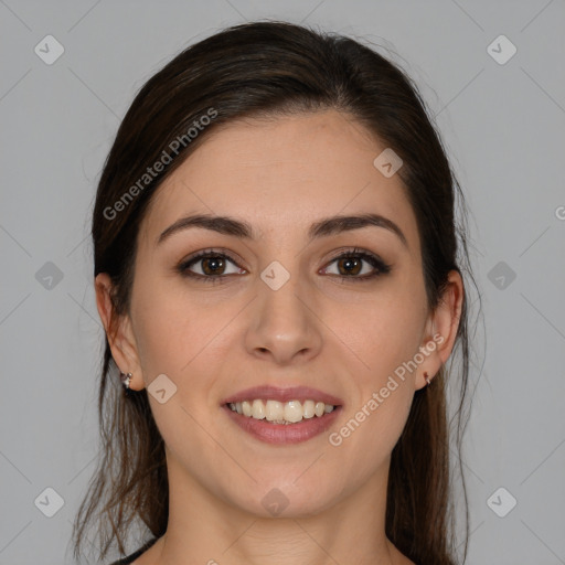 Joyful white young-adult female with medium  brown hair and brown eyes