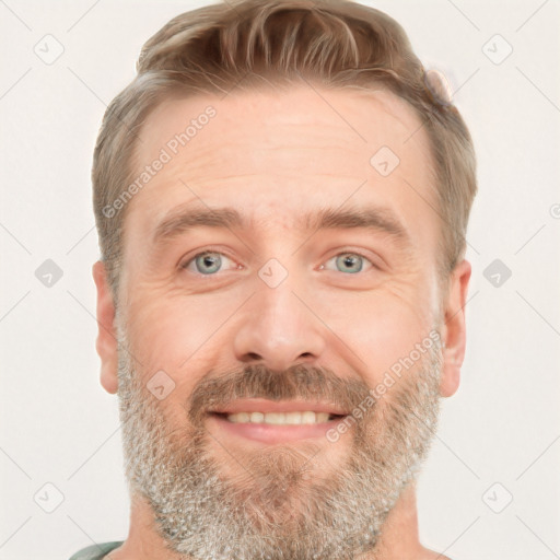 Joyful white adult male with short  brown hair and grey eyes