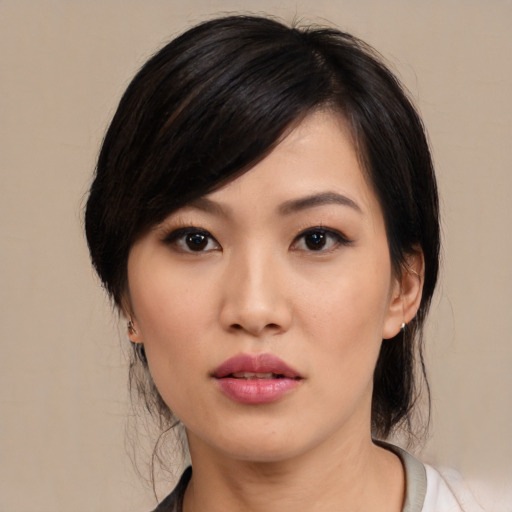 Neutral asian young-adult female with medium  black hair and brown eyes