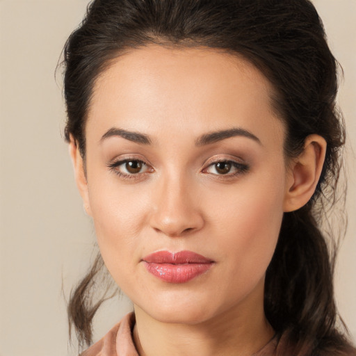 Joyful white young-adult female with long  brown hair and brown eyes