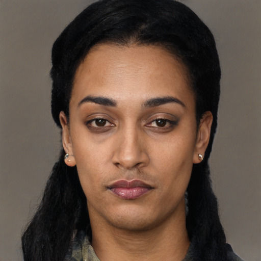 Neutral latino young-adult female with long  black hair and brown eyes