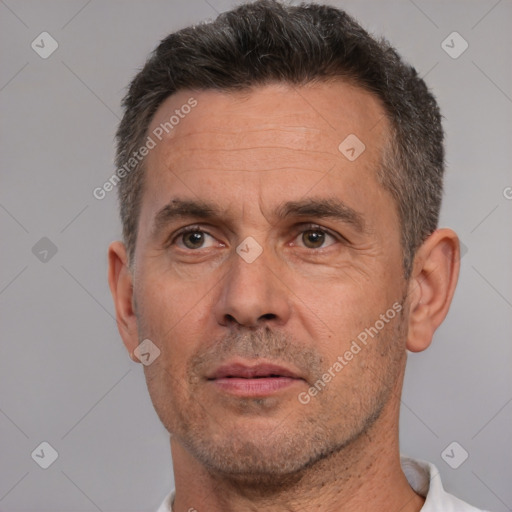 Neutral white adult male with short  brown hair and brown eyes