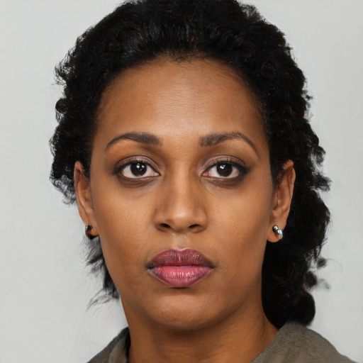 Neutral black young-adult female with long  black hair and brown eyes