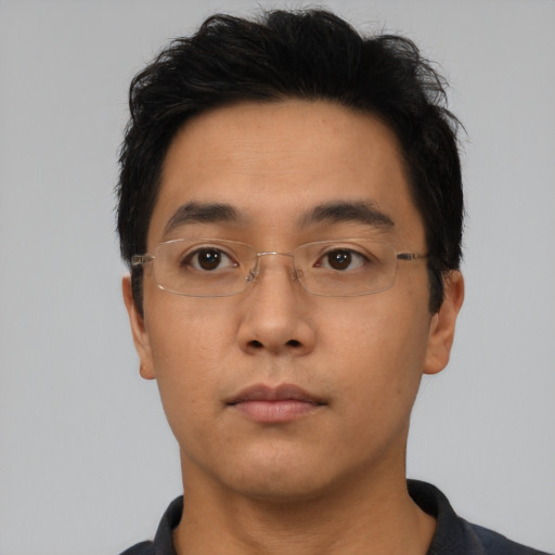 Neutral asian young-adult male with short  black hair and brown eyes