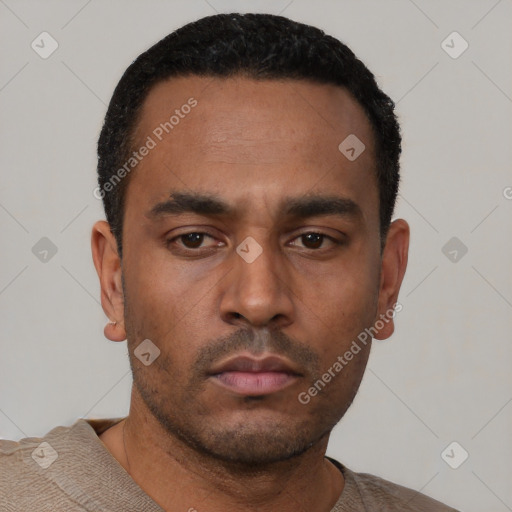 Neutral latino young-adult male with short  black hair and brown eyes