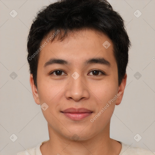 Joyful asian young-adult male with short  brown hair and brown eyes