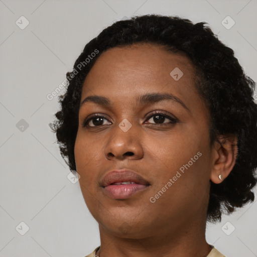 Neutral black young-adult female with short  black hair and brown eyes