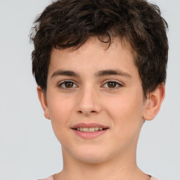 Joyful white child male with short  brown hair and brown eyes