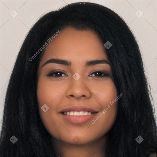 Joyful latino young-adult female with long  black hair and brown eyes