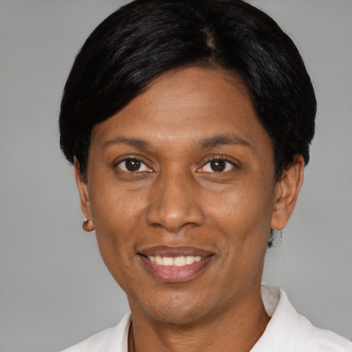 Joyful asian adult female with short  black hair and brown eyes