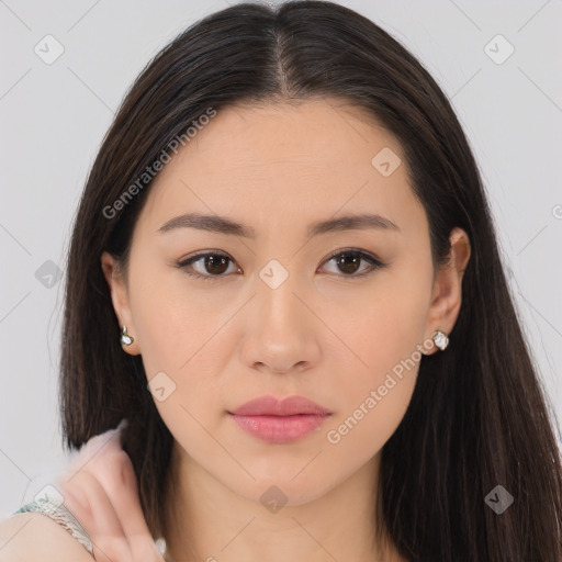 Neutral white young-adult female with long  brown hair and brown eyes