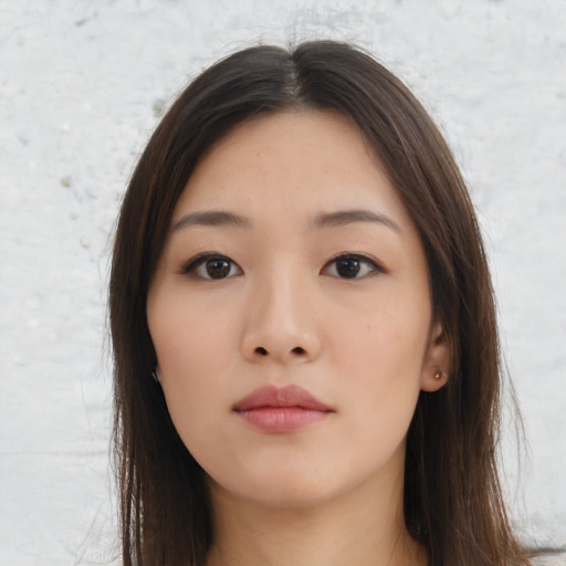 Neutral asian young-adult female with long  brown hair and brown eyes