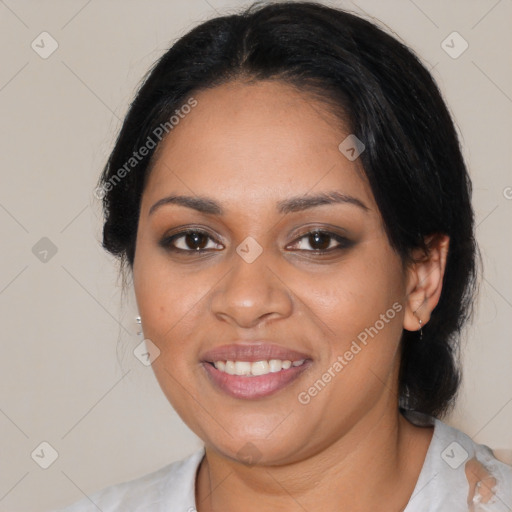 Joyful latino young-adult female with medium  brown hair and brown eyes