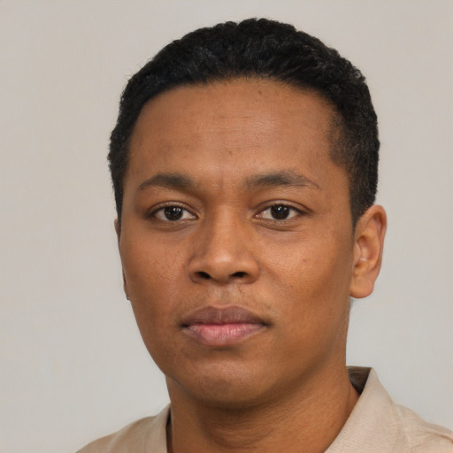 Neutral black young-adult male with short  black hair and brown eyes