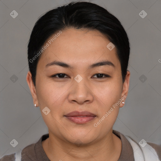 Joyful asian young-adult female with short  black hair and brown eyes