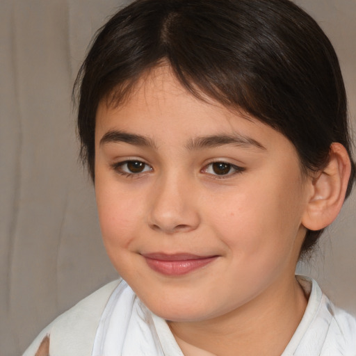 Joyful white child female with medium  brown hair and brown eyes