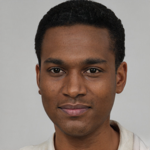 Neutral black young-adult male with short  black hair and brown eyes