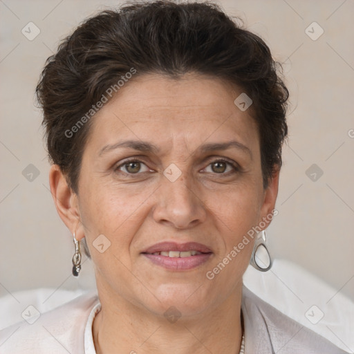 Joyful white adult female with short  brown hair and brown eyes