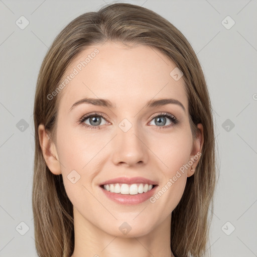 Joyful white young-adult female with medium  brown hair and green eyes