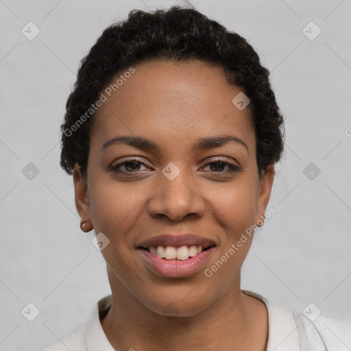 Joyful latino young-adult female with short  black hair and brown eyes