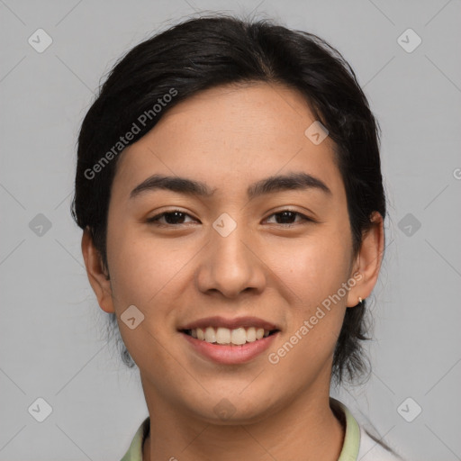 Joyful asian young-adult female with medium  black hair and brown eyes