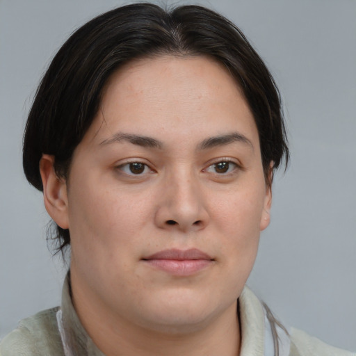 Neutral asian young-adult female with short  brown hair and brown eyes